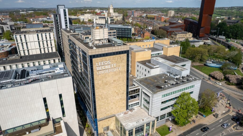 A detailed aerial view of Leeds Beckett University in Leeds, England, showcasing urban architecture.